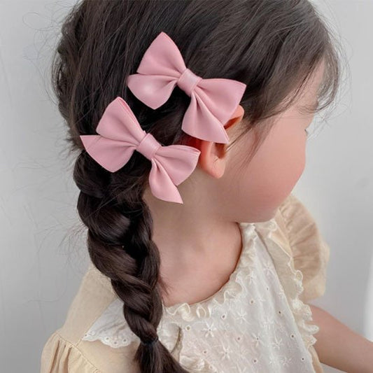 Barrette cheveux enfant nœud papillon double boucle ruban satiné élégant