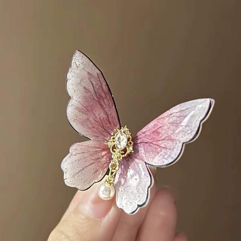 Barrette cheveux papillon rose  Vue de proche