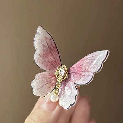 Barrette cheveux papillon rose  Vue de proche