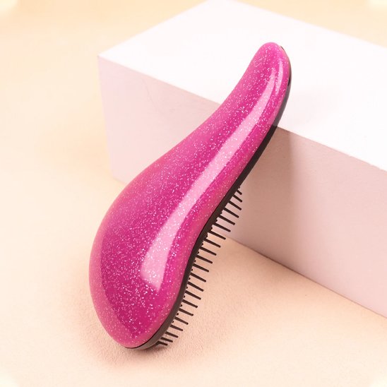Brosse à Brosse démêlante ergonomique - vue de profil montrant forme