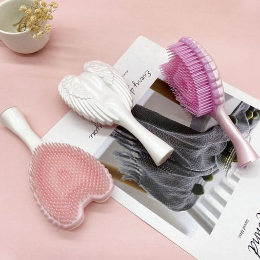 Brosse à cheveux demelante anti-noeud blanc rose