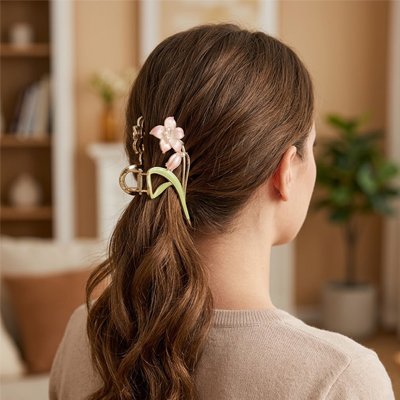 	Pince Cheveux Florale Dorée – queue de cheval bas