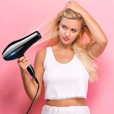 Sèche-Cheveux PowerDry Pro femme blonde séchant cheveux facilement