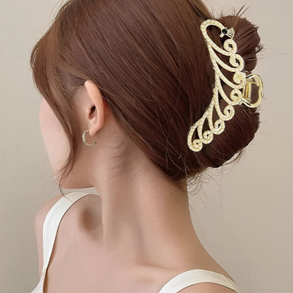 cheveux en place impeccable  pince a cheveux forme paon