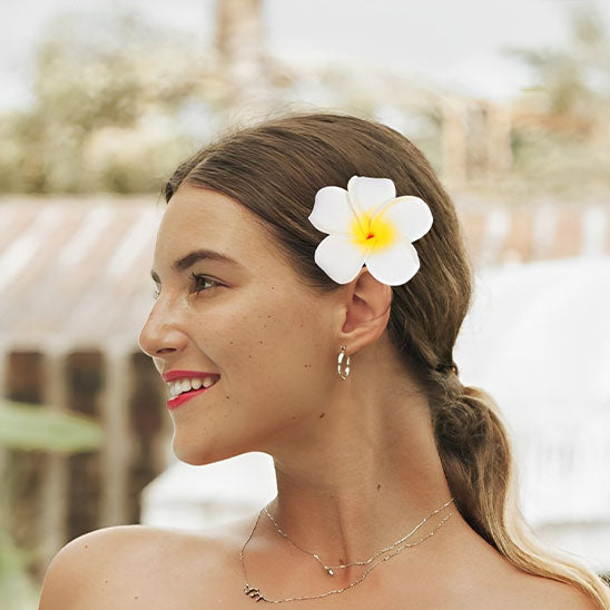 detente garanti pince a cheveux fleur hawaienne