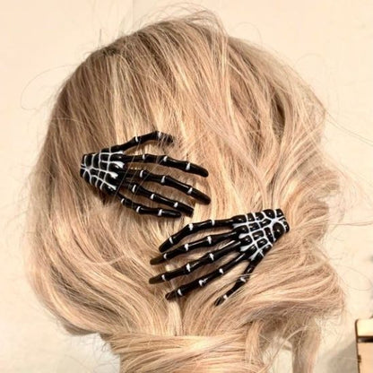 fans horreur pince a cheveux mains squelette