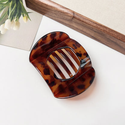 pince a cheveux ronde motif marron leopard