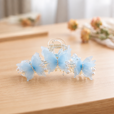 Pince papillons bleue
