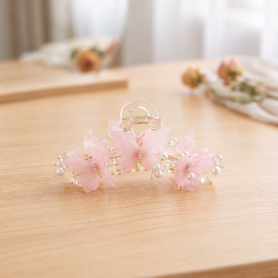 Pince papillons rose